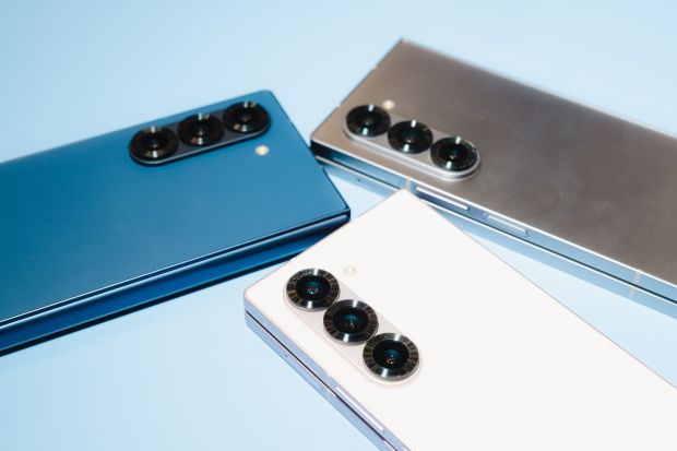 Three Samsung Galaxy Z Fold6 smartphones in different colors.