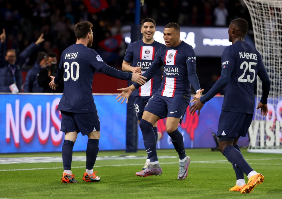 PSG players celebrating a goal.