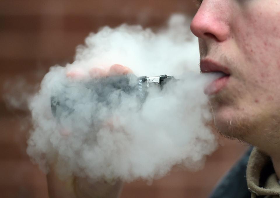 Person vaping.