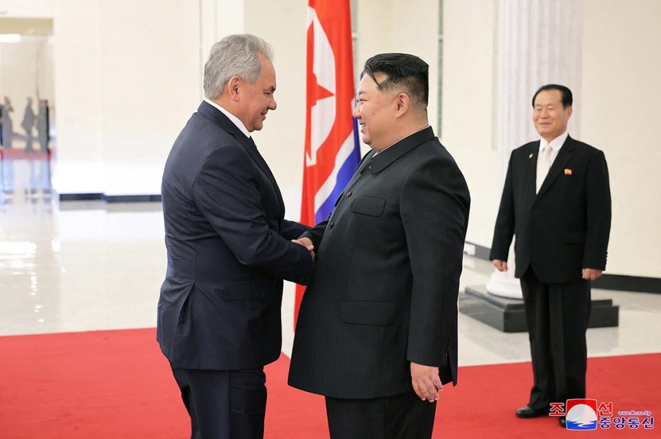 North Korean leader Kim Jong Un and Russian President Vladimir Putin's top security adviser Sergei Shoigu shake hands during Shoigu's visit to North Korea, in this photo released by North Korea's official Korean Central News Agency March 22, 2025. KCNA via REUTERS ATTENTION EDITORS - THIS IMAGE WAS PROVIDED BY A THIRD PARTY. REUTERS IS UNABLE TO INDEPENDENTLY VERIFY THIS IMAGE. NO THIRD PARTY SALES. SOUTH KOREA OUT. NO COMMERCIAL OR EDITORIAL SALES IN SOUTH KOREA.