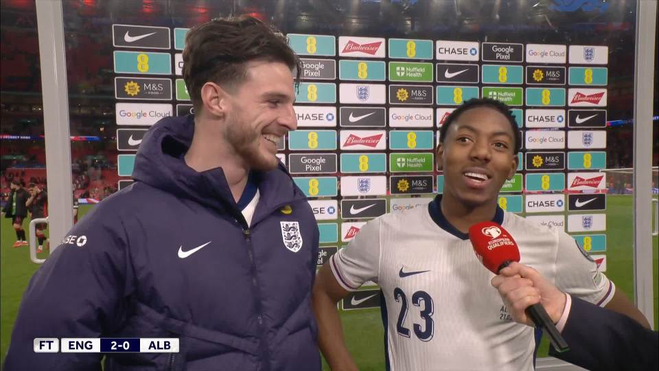 Two England soccer players being interviewed after a 2-0 win.