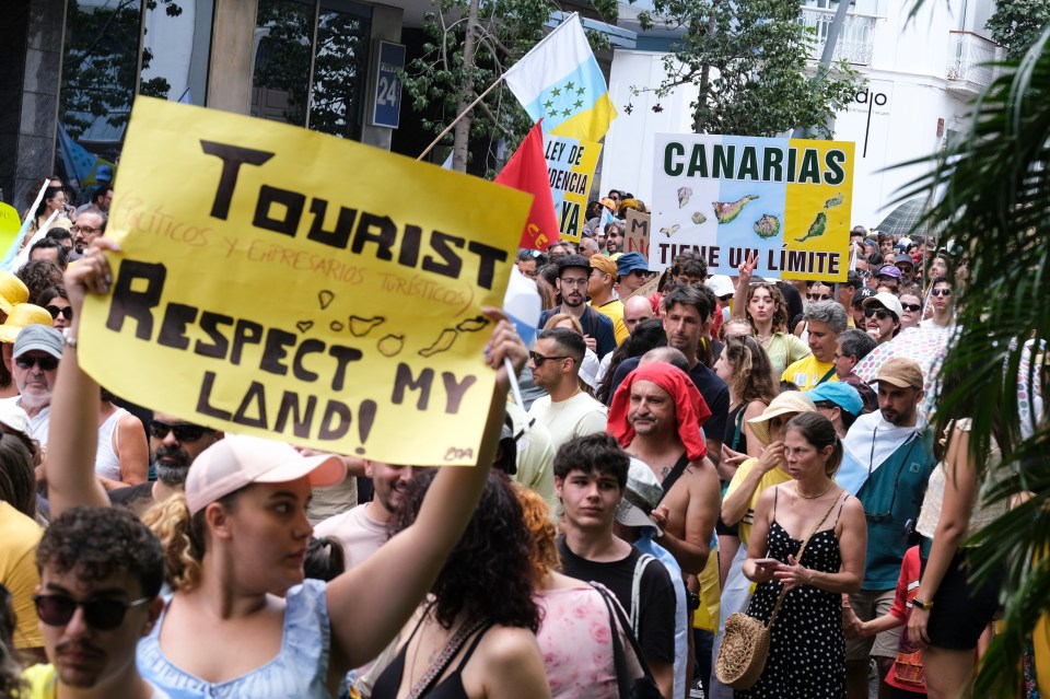 Protest in Canary Islands demanding tourism limits.