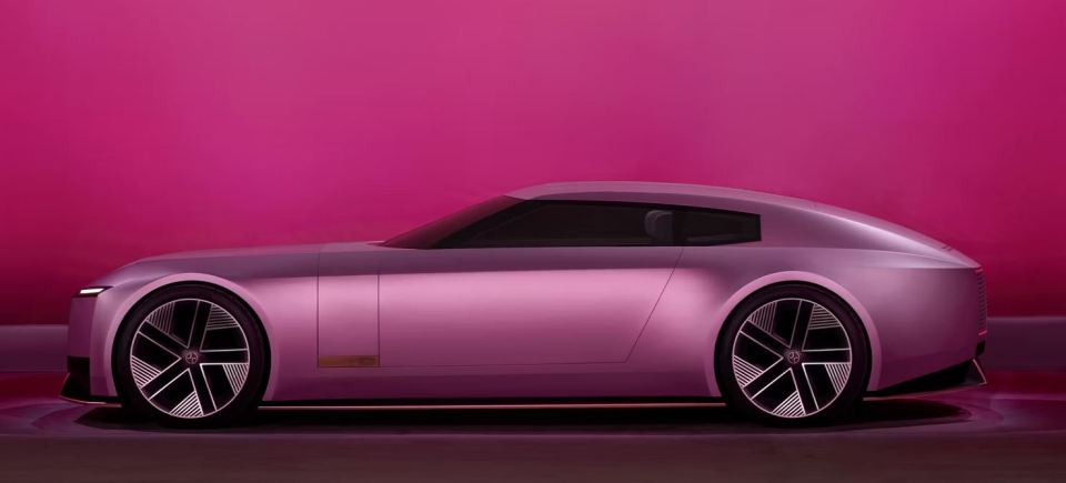 Side profile of a mauve Jaguar super-GT EV.