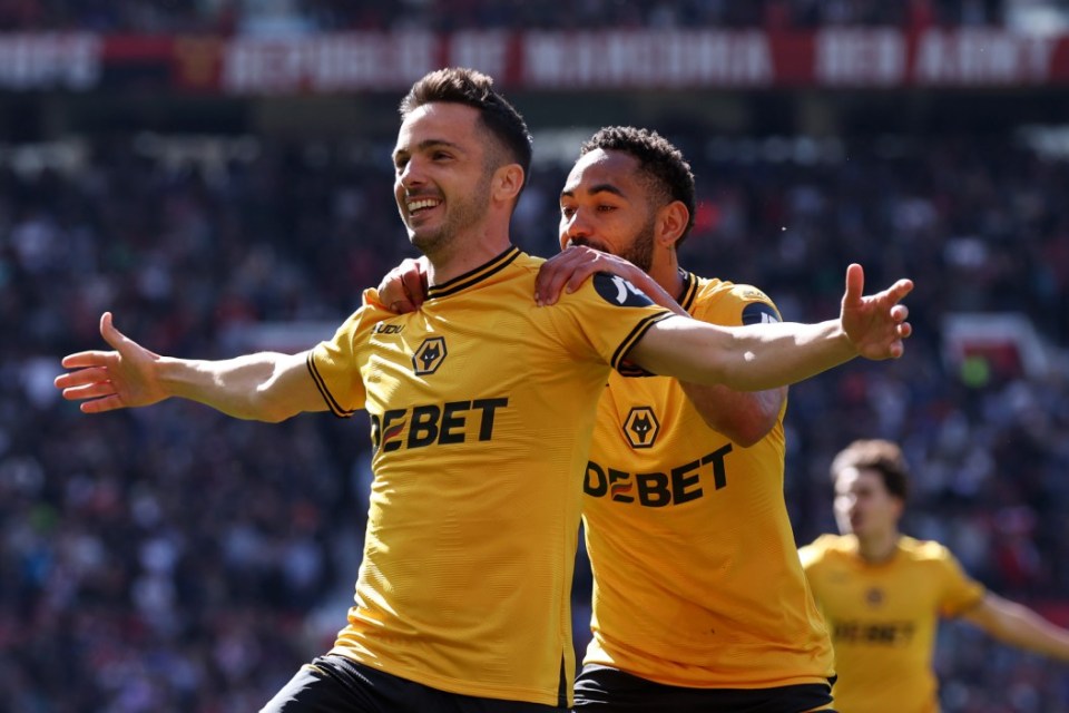 MANCHESTER, ENGLAND - APRIL 20: Pablo Sarabia of Wolverhampton Wanderers celebrates scoring his team's first goal with teammate Matheus Cunha during the Premier League match between Manchester United FC and Wolverhampton Wanderers FC at Old Trafford on April 20, 2025 in Manchester, England. (Photo by Wolverhampton Wanderers FC/Wolves via Getty Images)