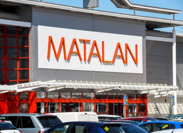 Matalan store entrance with cars in the parking lot.