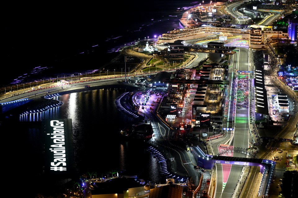 Aerial view of the Jeddah Corniche Circuit at night before a Formula One race.