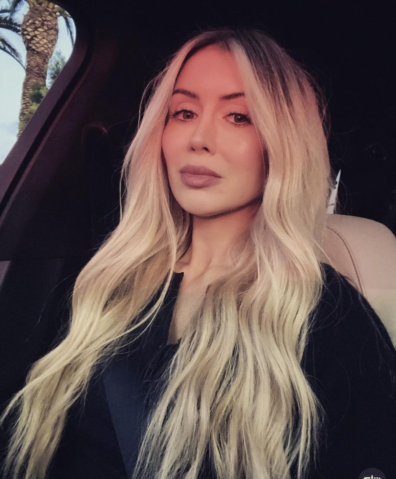 Woman with long blonde hair.
