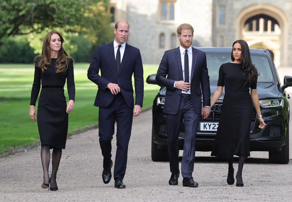 Prince William and Prince Harry viewing floral tributes to Queen Elizabeth II.
