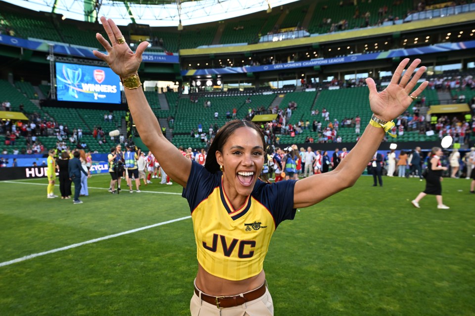 Alex Scott celebrating Arsenal's victory in the UEFA Women's Champions League final.