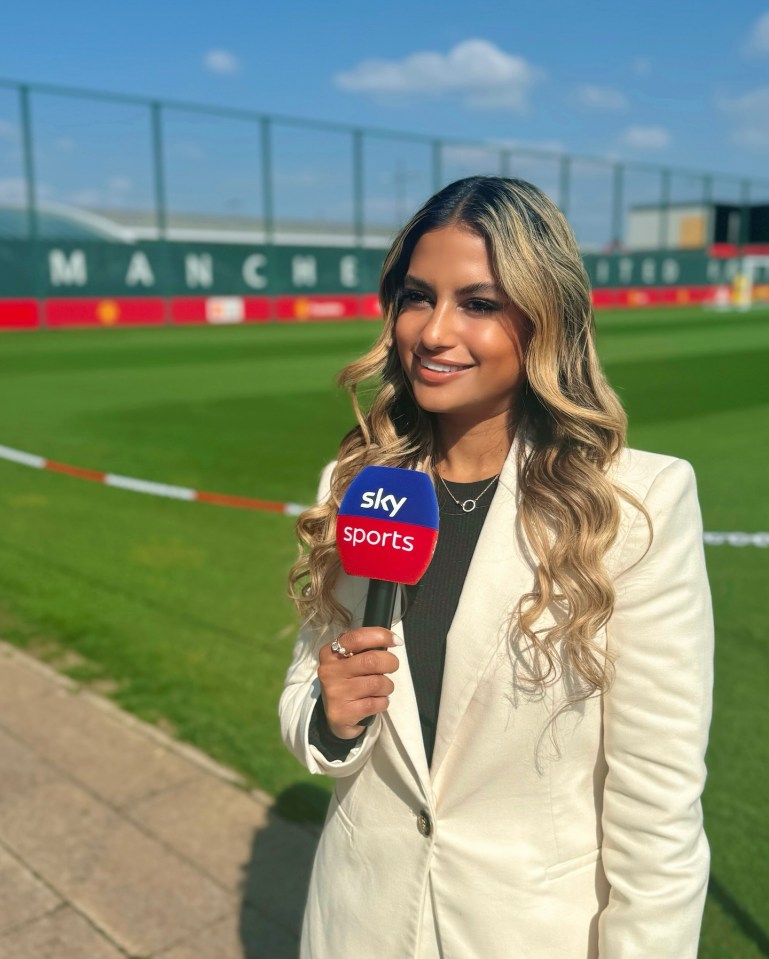 Melissa Reddy, Sky Sports presenter, holding a microphone.