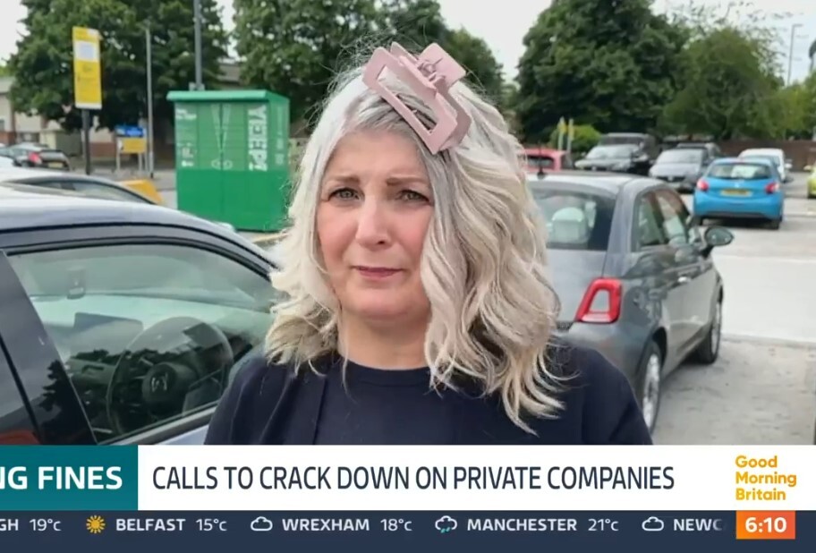 Woman interviewed on Good Morning Britain with hair clip.