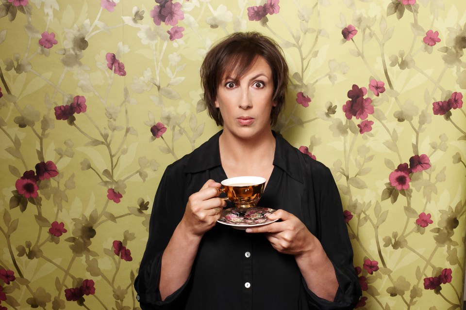 Miranda Hart holding a teacup.