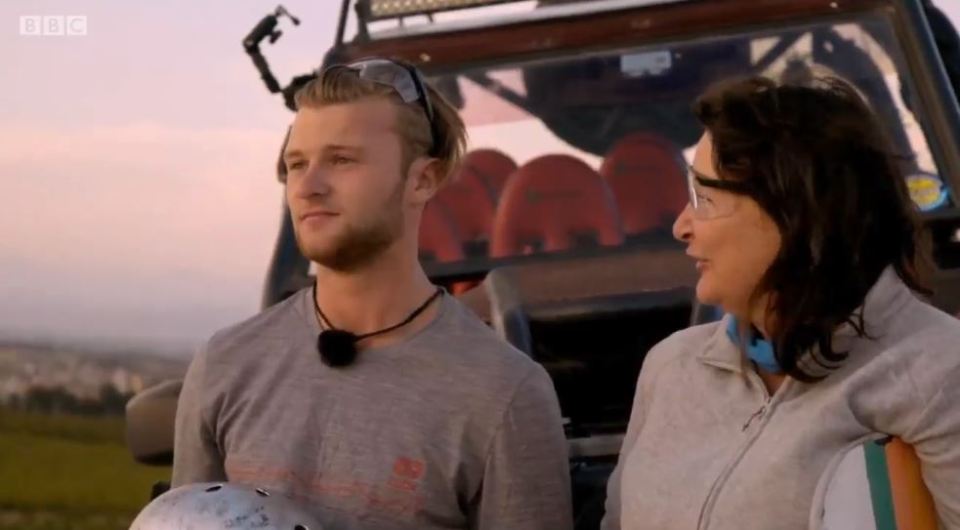 A young man and woman share an emotional moment.